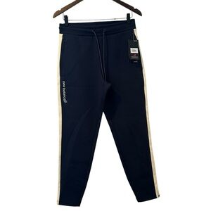 New Balance Men's Dark Blue Joggers with Cream Stripes Rich Paul